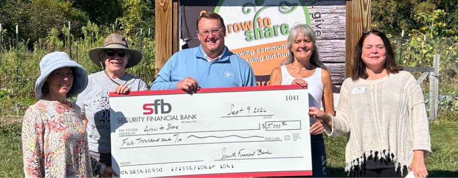 Security Financial Bank Donates $5000 to Grow to Share Community Garden